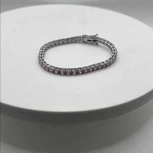 433. Elegant Silver and Pink Tennis Bracelet